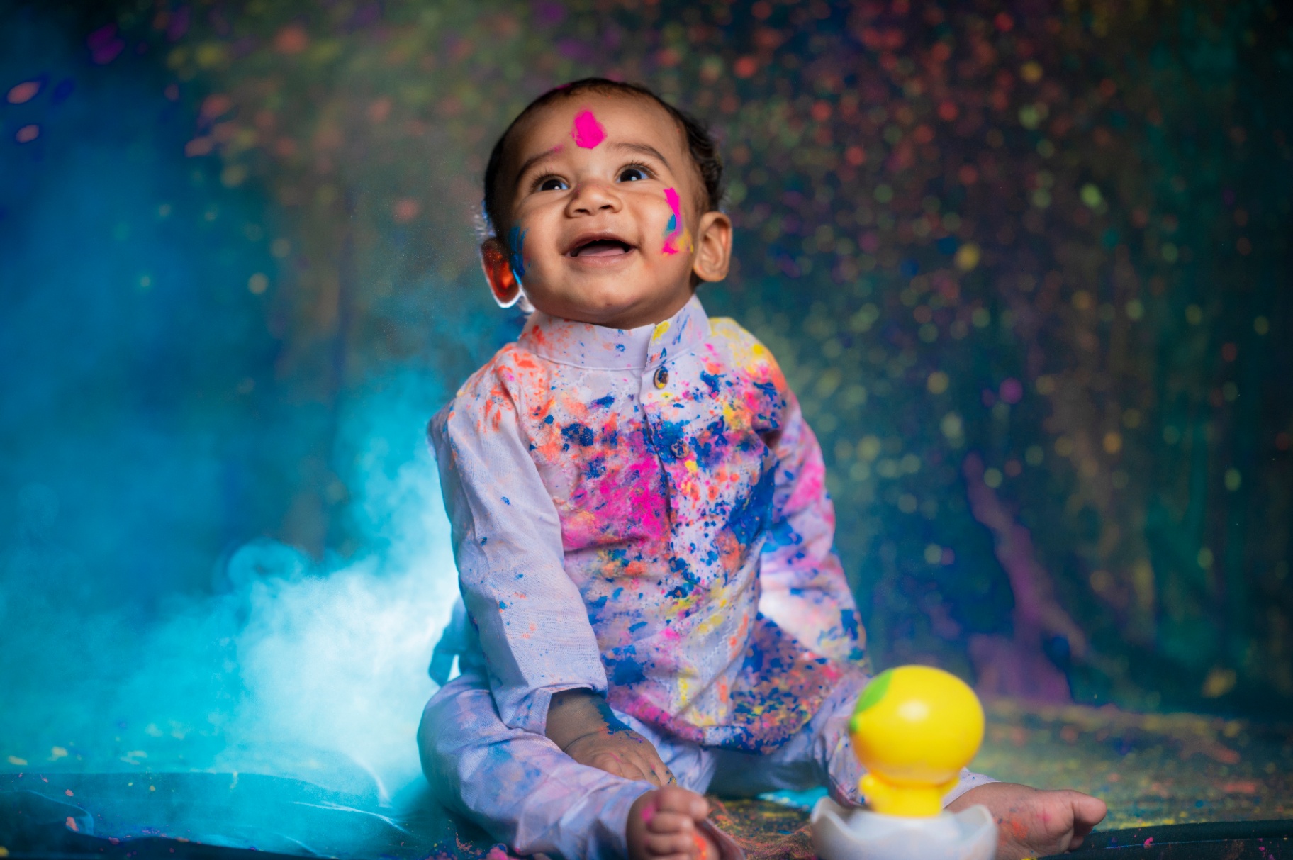 Baby celebrating Holi