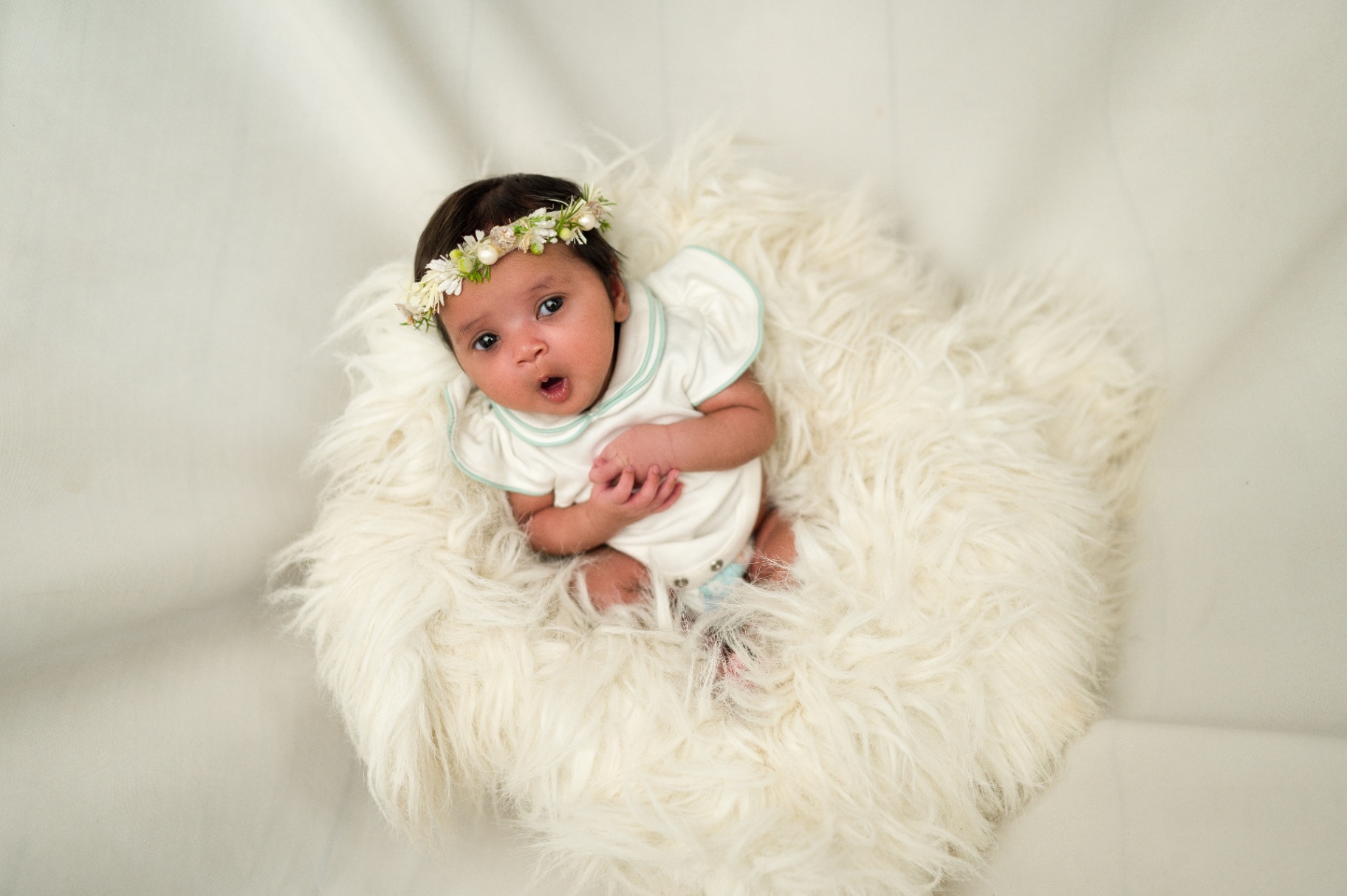 Newborn with floral crown